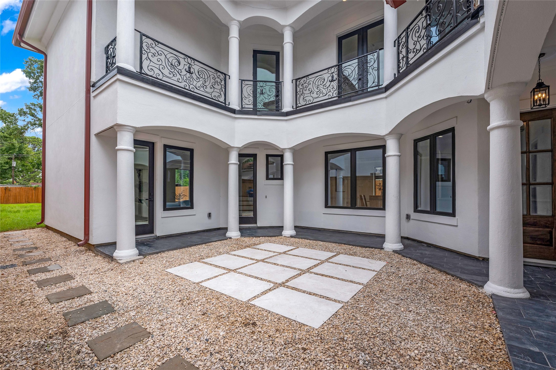 2031 Peppermill Road Houston, TX 77080 - Photo 4 of 48 Nearly every room in the home has views of the elegant corridor.