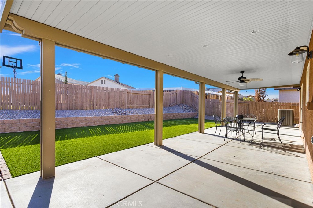 11979 Luna Road Victorville, CA 92392 - Photo 44 of 49 a view of a backyard with a patio