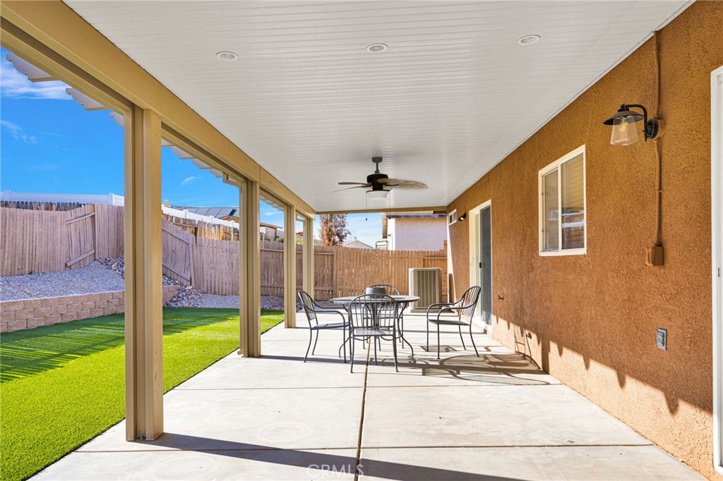 11979 Luna Road Victorville, CA 92392 - Photo 45 of 49 a building outdoor space with patio furniture and garden