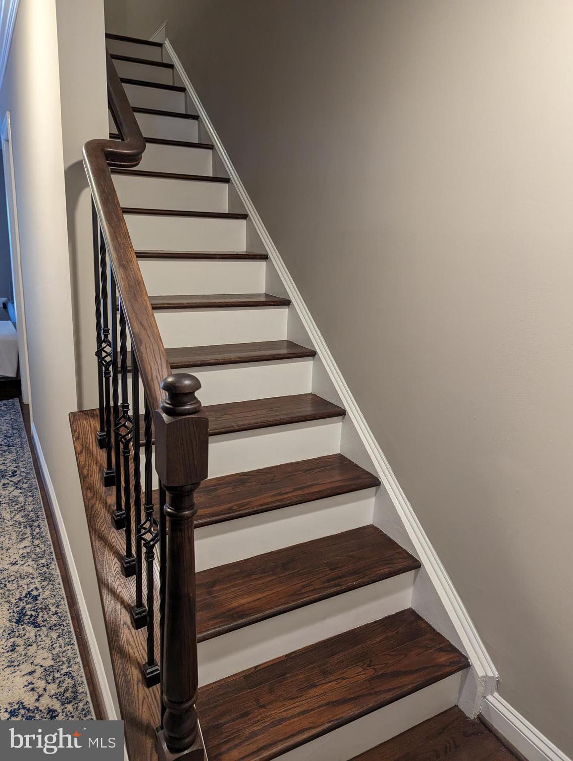 8914 Shamrock Court Springfield, VA 22152 - Photo 10 of 17 Wooden staircase leading upstairs