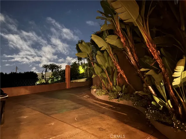 a view of an empty room with a fireplace