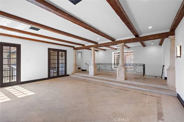 a living room with furniture a window and a fireplace