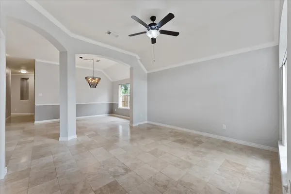 a kitchen with granite countertop cabinets stainless steel appliances and a counter space