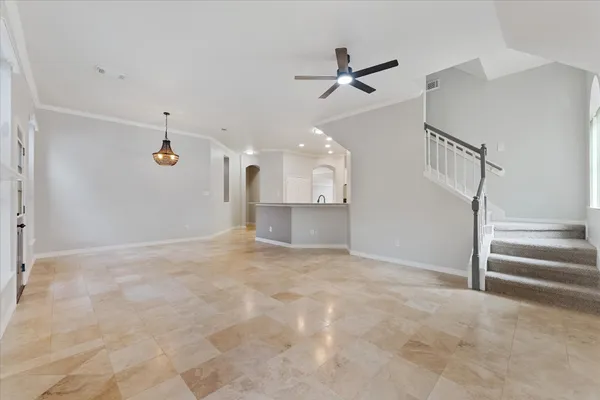 a spacious bathroom with a double vanity sink a large mirror and a bathtub