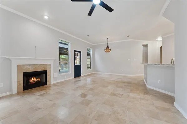 a spacious bathroom with a tub sink and mirror