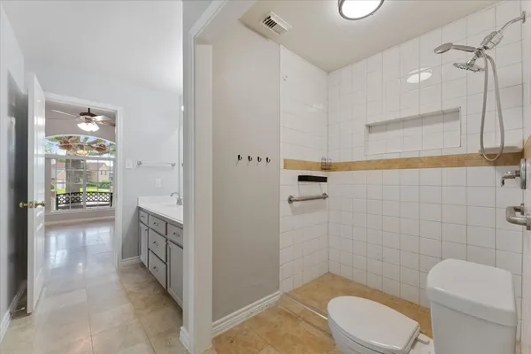 a view of a house with a yard and a deck