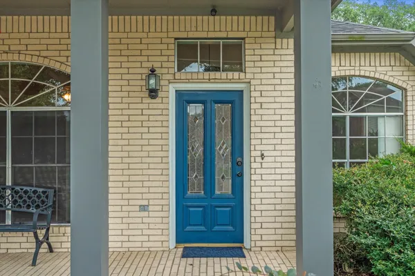 a front view of a house with a glass door