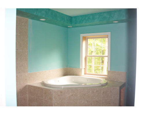 3235 Mountain Road Suffield, CT 06093 - Photo 10 of 11 a bathroom with a window and a bathtub