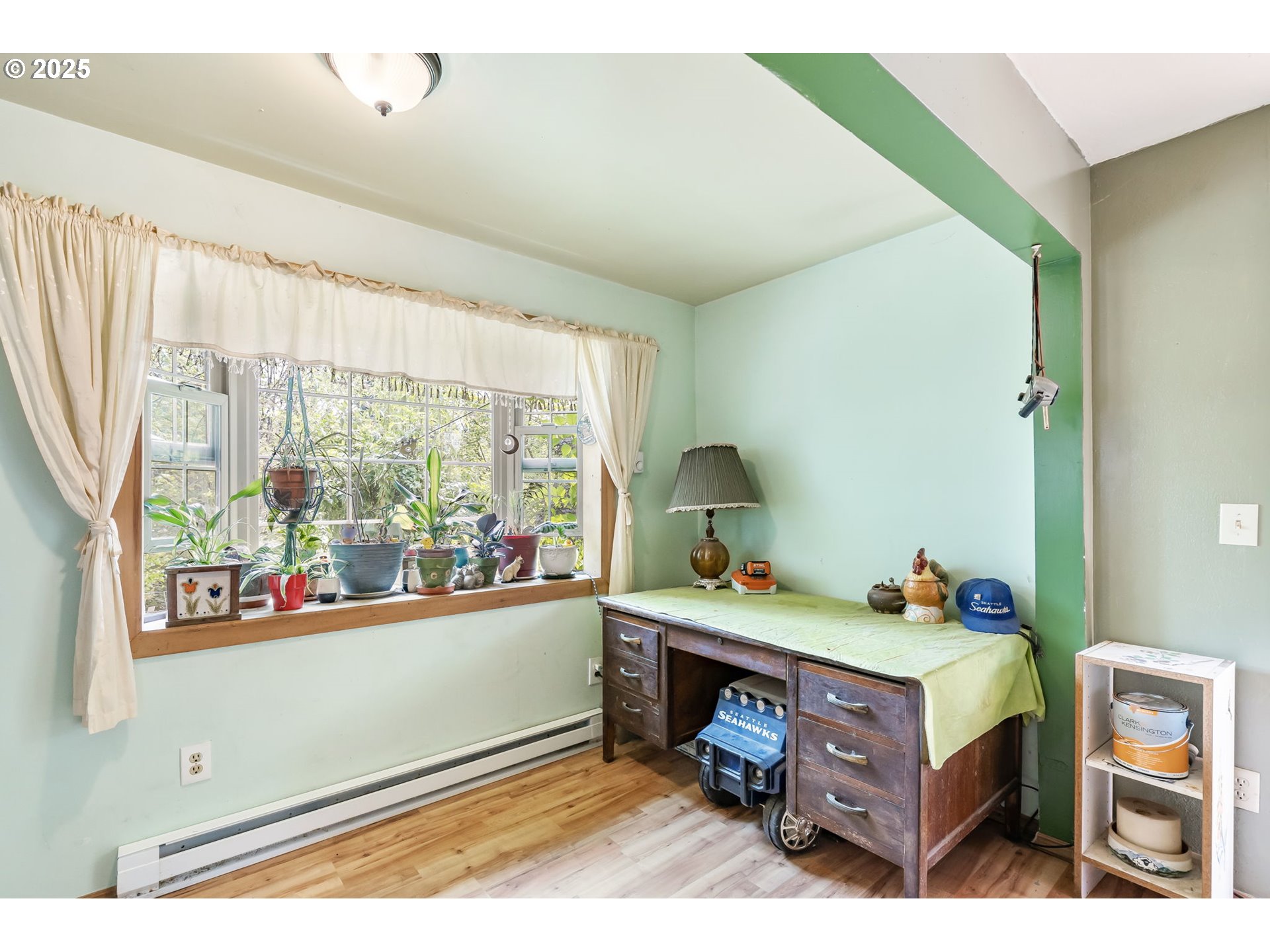 51557 Southwest Em Watts Road Scappoose, OR 97056 - Photo 15 of 40 a room with a bed and a window