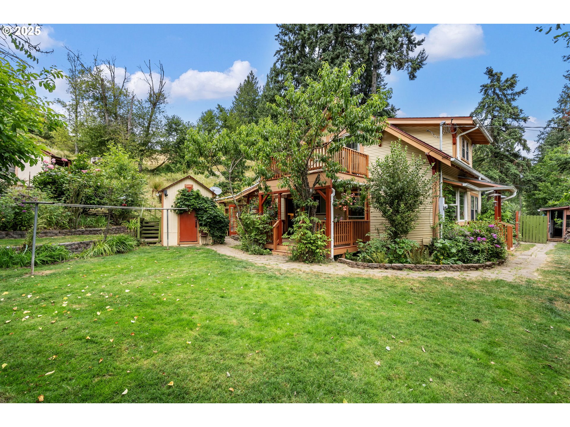51557 Southwest Em Watts Road Scappoose, OR 97056 - Photo 2 of 40 a view of a house with a yard