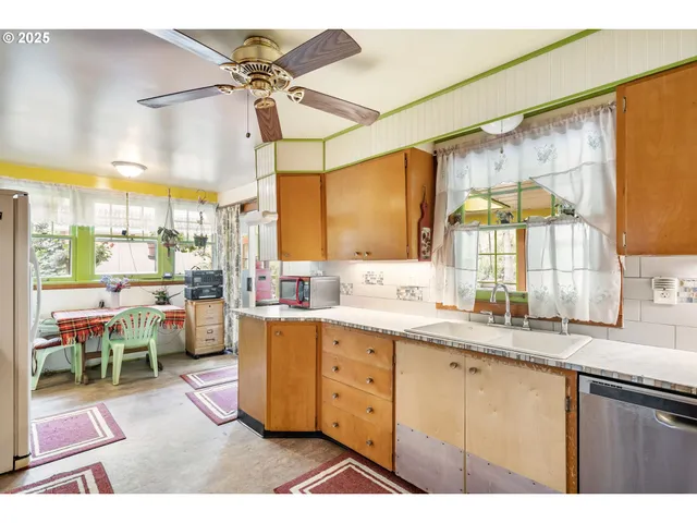 a view of a balcony with wooden floor