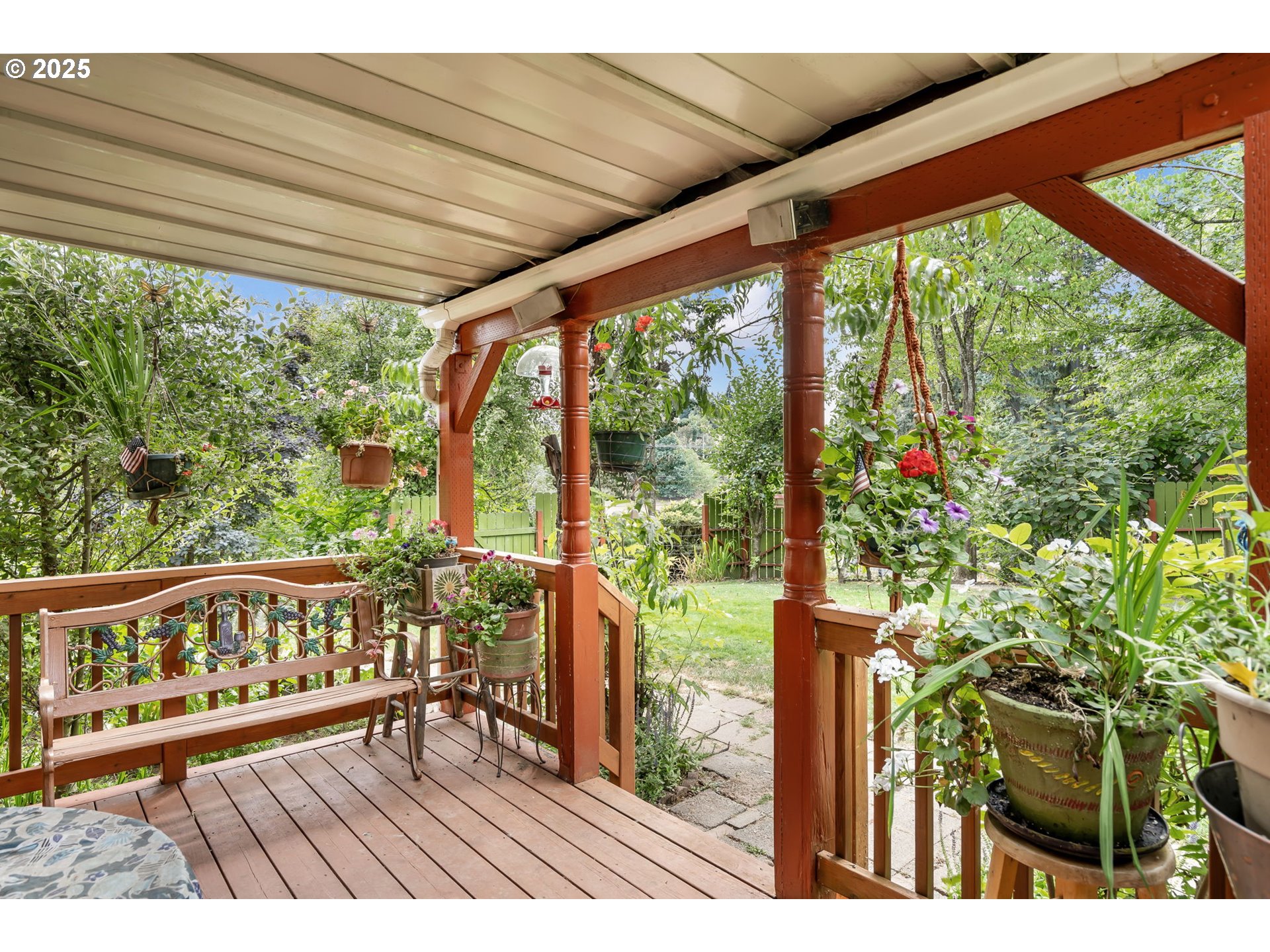 51557 Southwest Em Watts Road Scappoose, OR 97056 - Photo 6 of 40 a view of a balcony with wooden floor