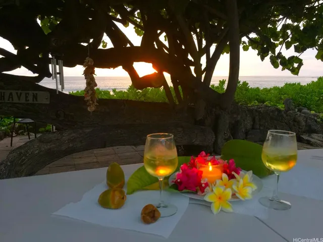 a kitchen with stainless steel appliances kitchen island granite countertop a refrigerator and microwave