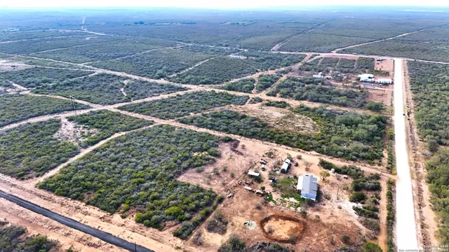 a view of a yard with an outdoor space