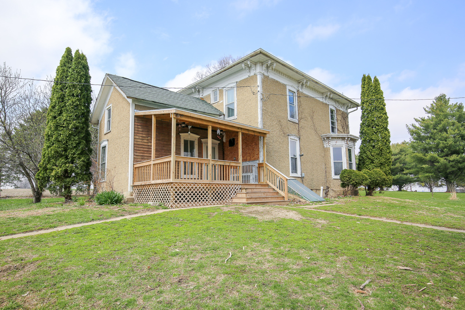26596 Fairhaven Road Chadwick, IL 61014 - Photo 11 of 51 a front view of a house with a yard