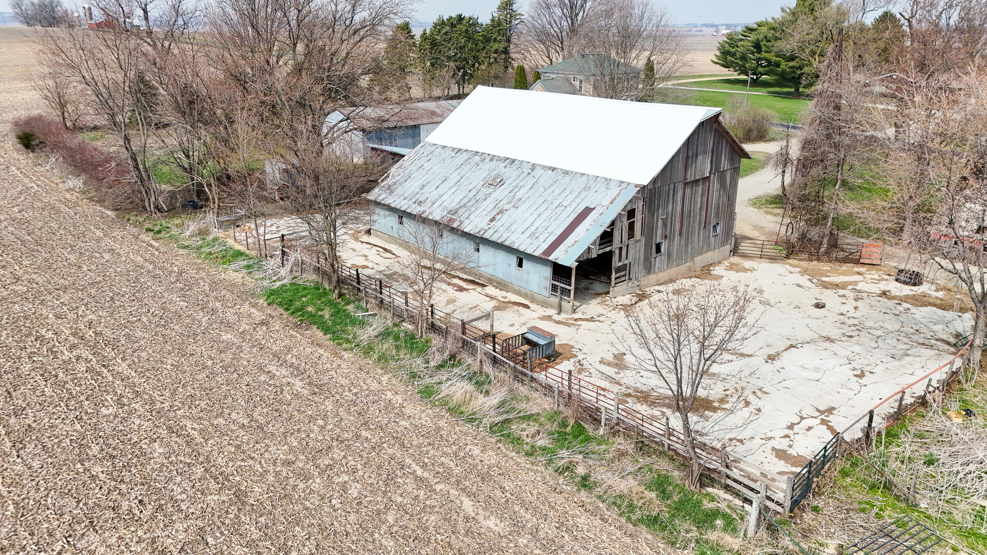 26596 Fairhaven Road Chadwick, IL 61014 - Photo 51 of 51 a view of a backyard with wooden fence