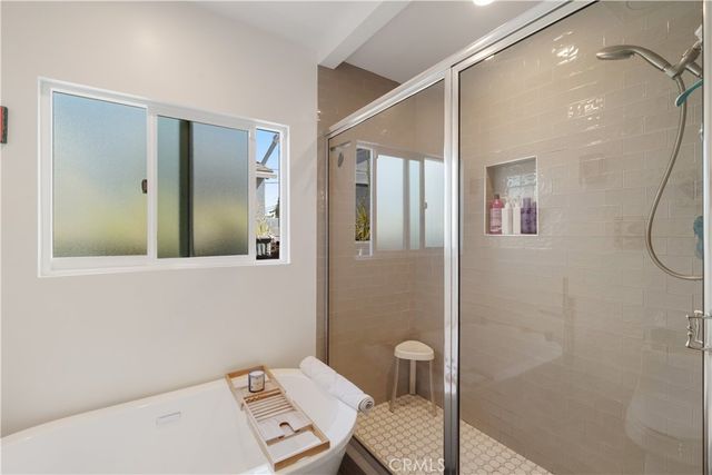 a bathroom with a sink mirror and toilet