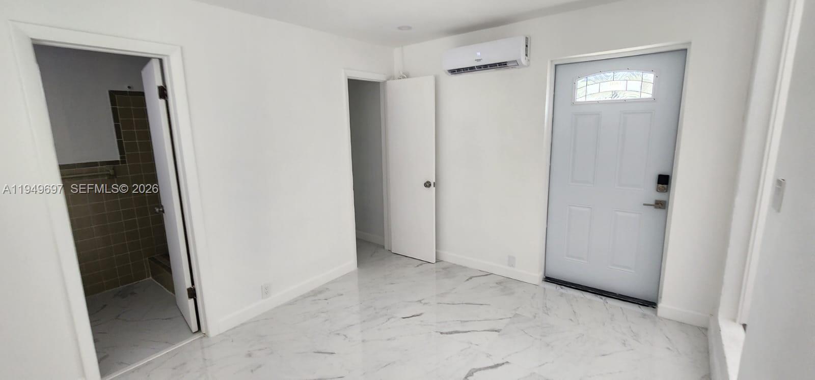 3520 Northwest 20th Street, Unit 2 Miami, FL 33142 - Photo 3 of 10 a view of an empty room