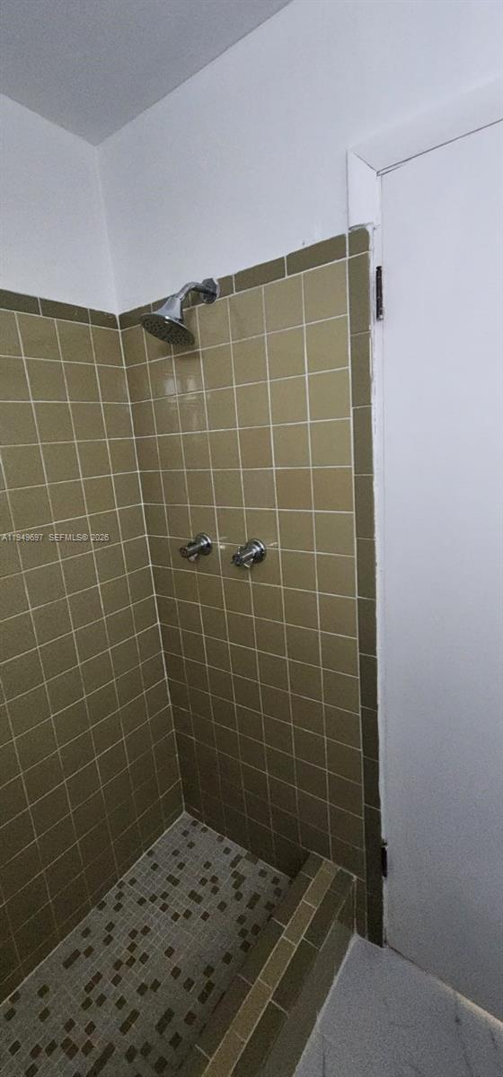 3520 Northwest 20th Street, Unit 2 Miami, FL 33142 - Photo 4 of 10 a bathroom with a shower