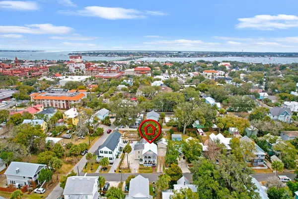 an aerial view of city and green space