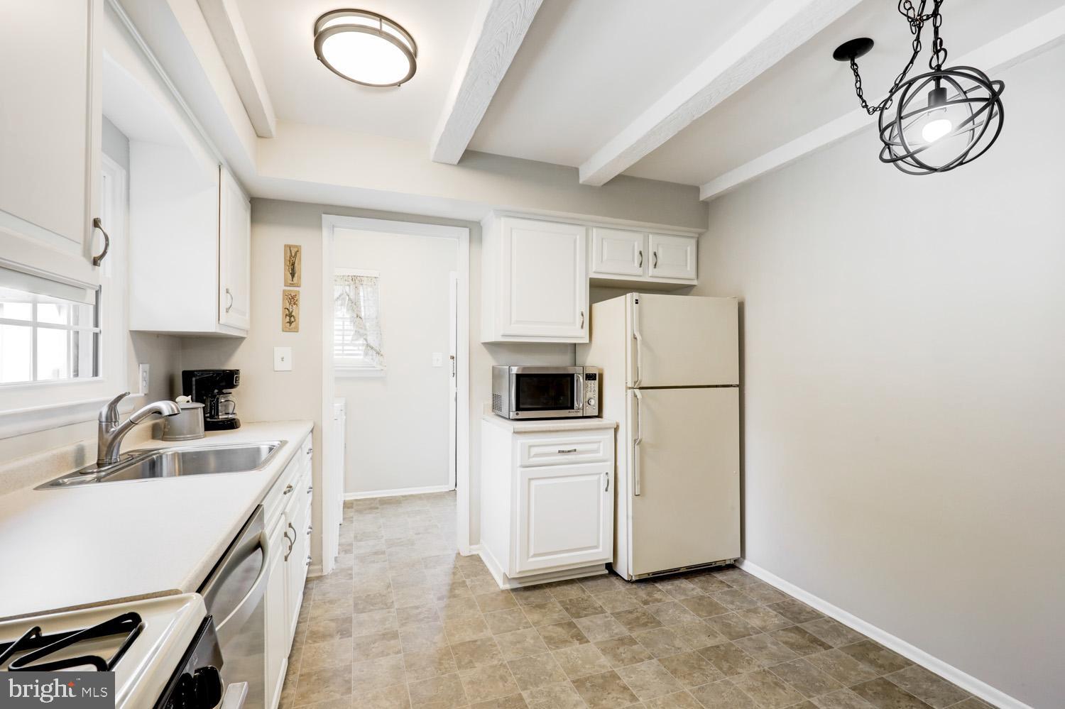 425 Valleybrook Drive Lancaster, PA 17601 - Photo 7 of 50 a kitchen with refrigerator cabinets and a sink
