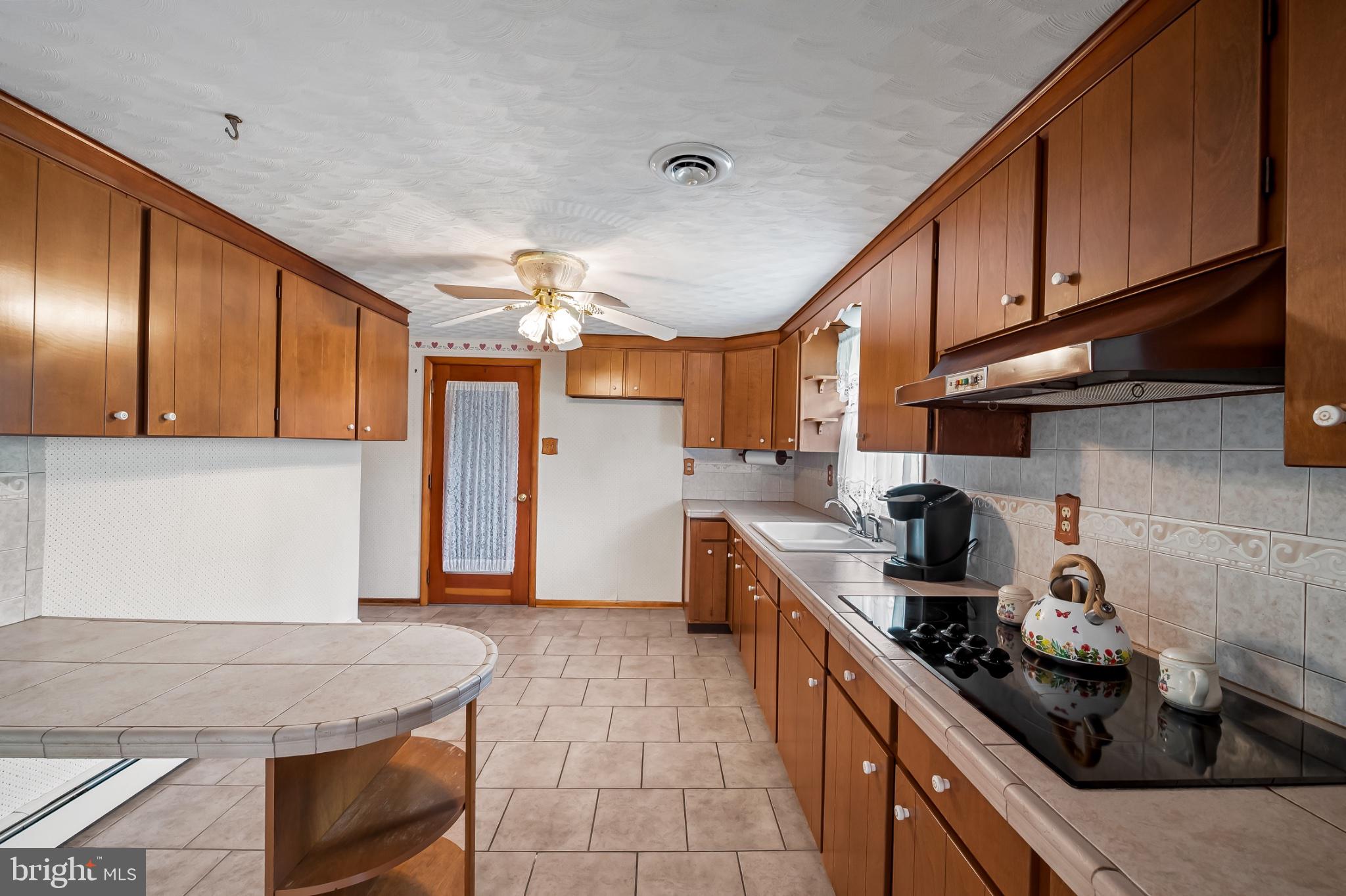 2100 Peterman Road Freeland, MD 21053 - Photo 13 of 36 Warm wooden kitchen with inviting charm.