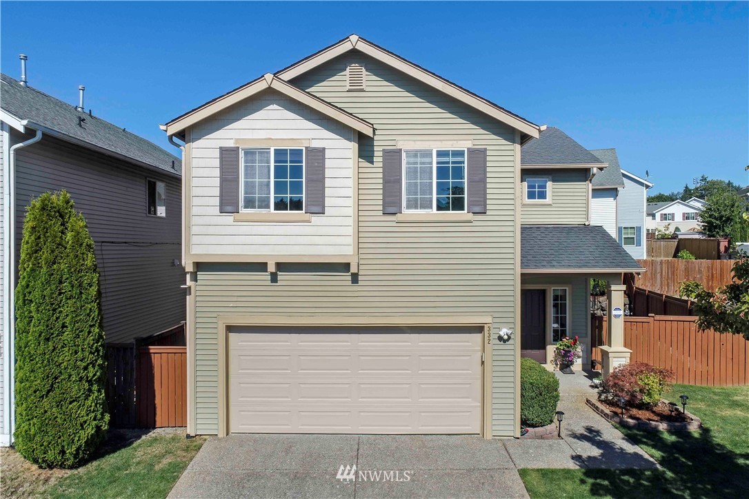 332 Index Avenue Southeast Renton, WA 98056 - Photo 1 of 23 a front view of a house with garden