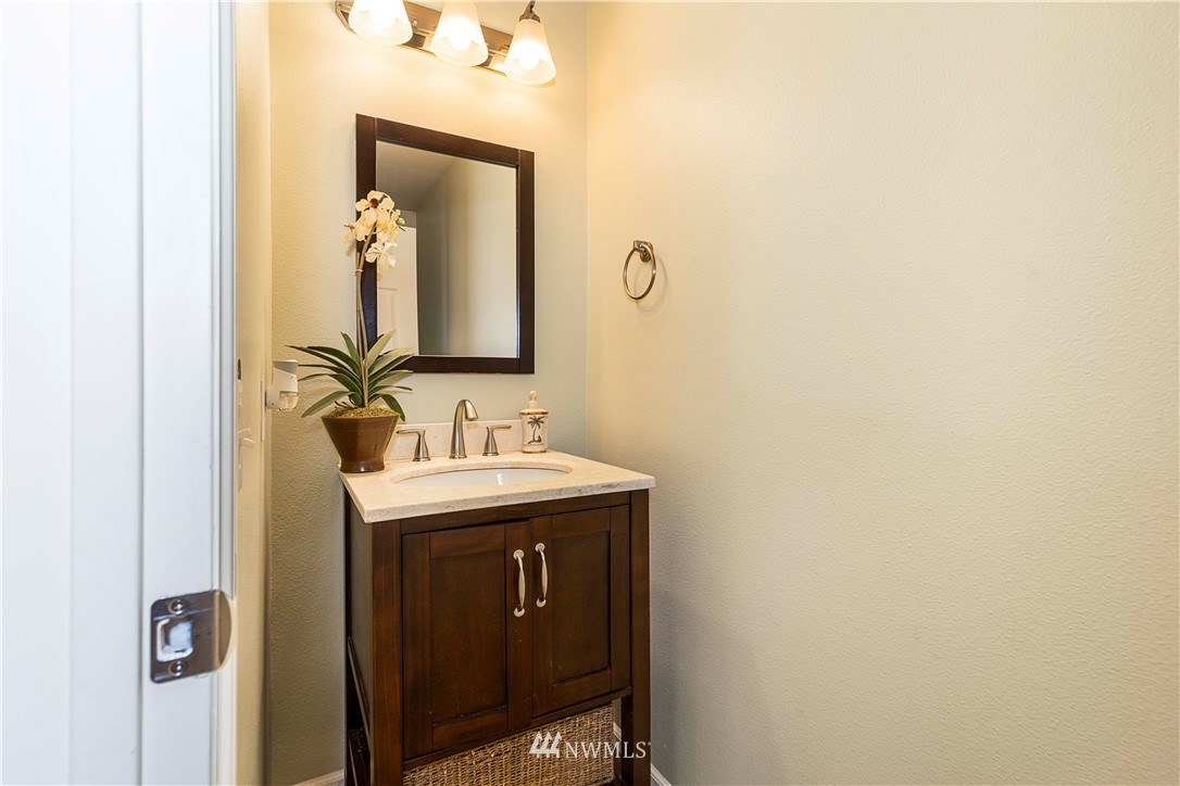 332 Index Avenue Southeast Renton, WA 98056 - Photo 13 of 23 a bathroom with a sink and a mirror