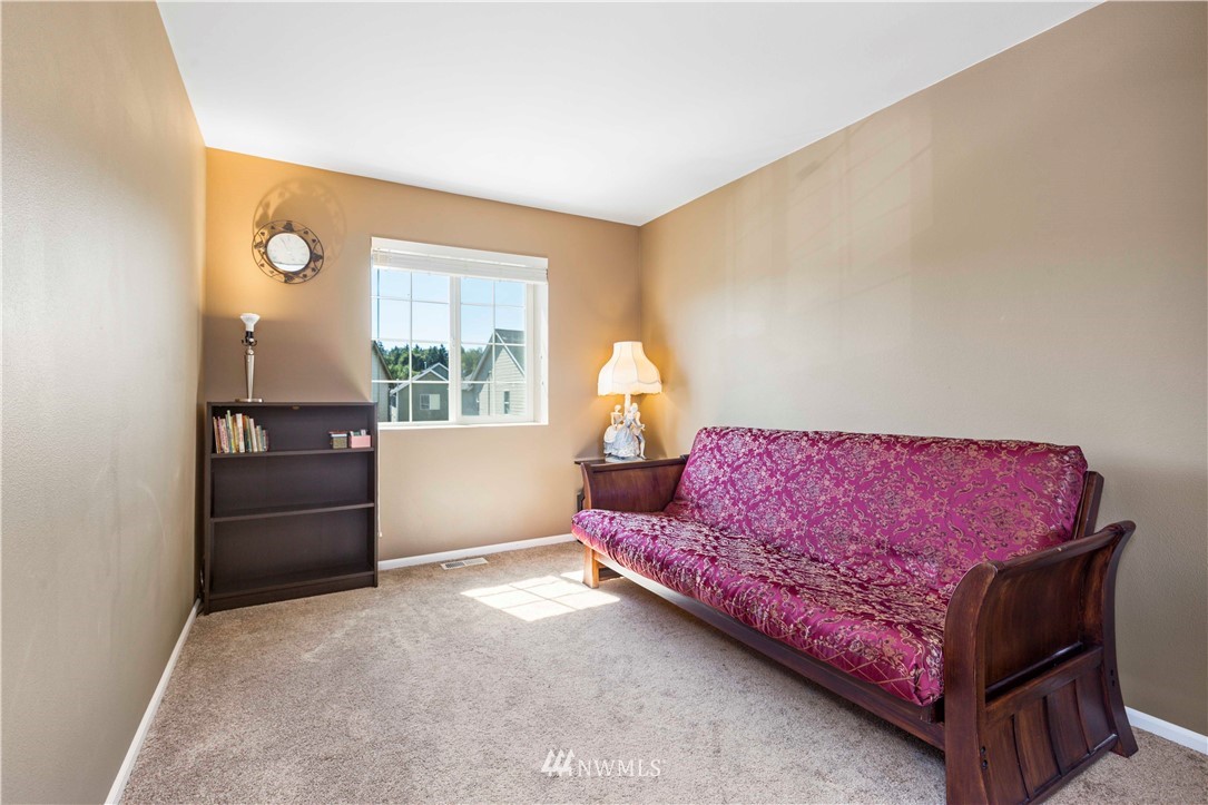 332 Index Avenue Southeast Renton, WA 98056 - Photo 18 of 23 a bed room with a bed and a window