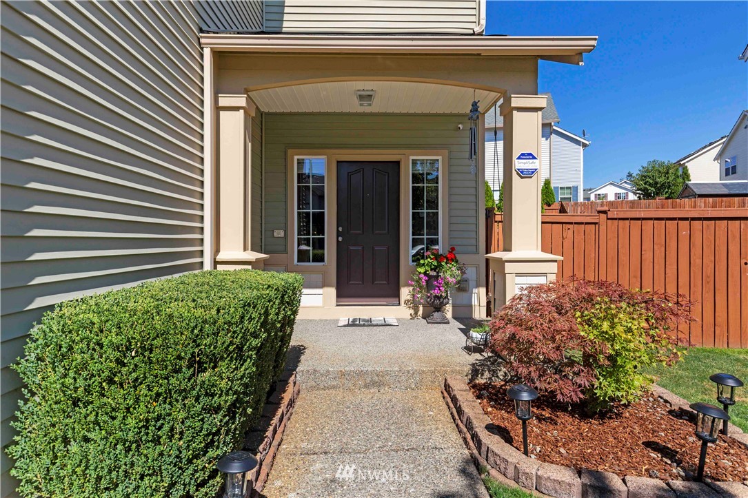 332 Index Avenue Southeast Renton, WA 98056 - Photo 3 of 23 a view of a house with potted plants