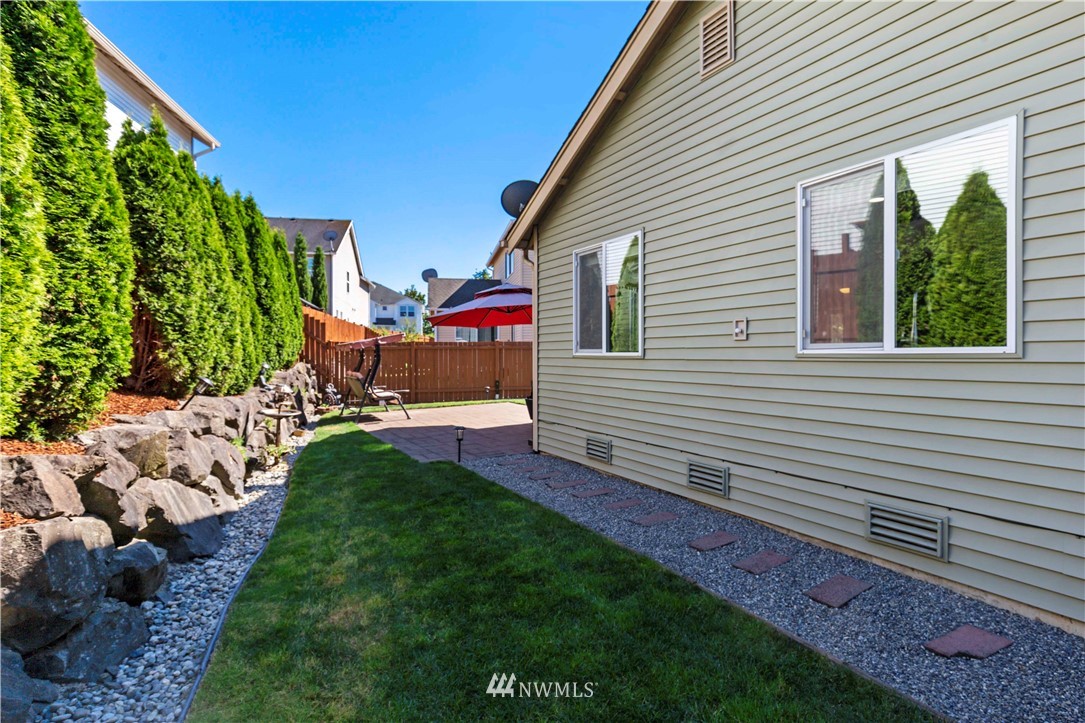 332 Index Avenue Southeast Renton, WA 98056 - Photo 22 of 23 a front view of a house with a yard