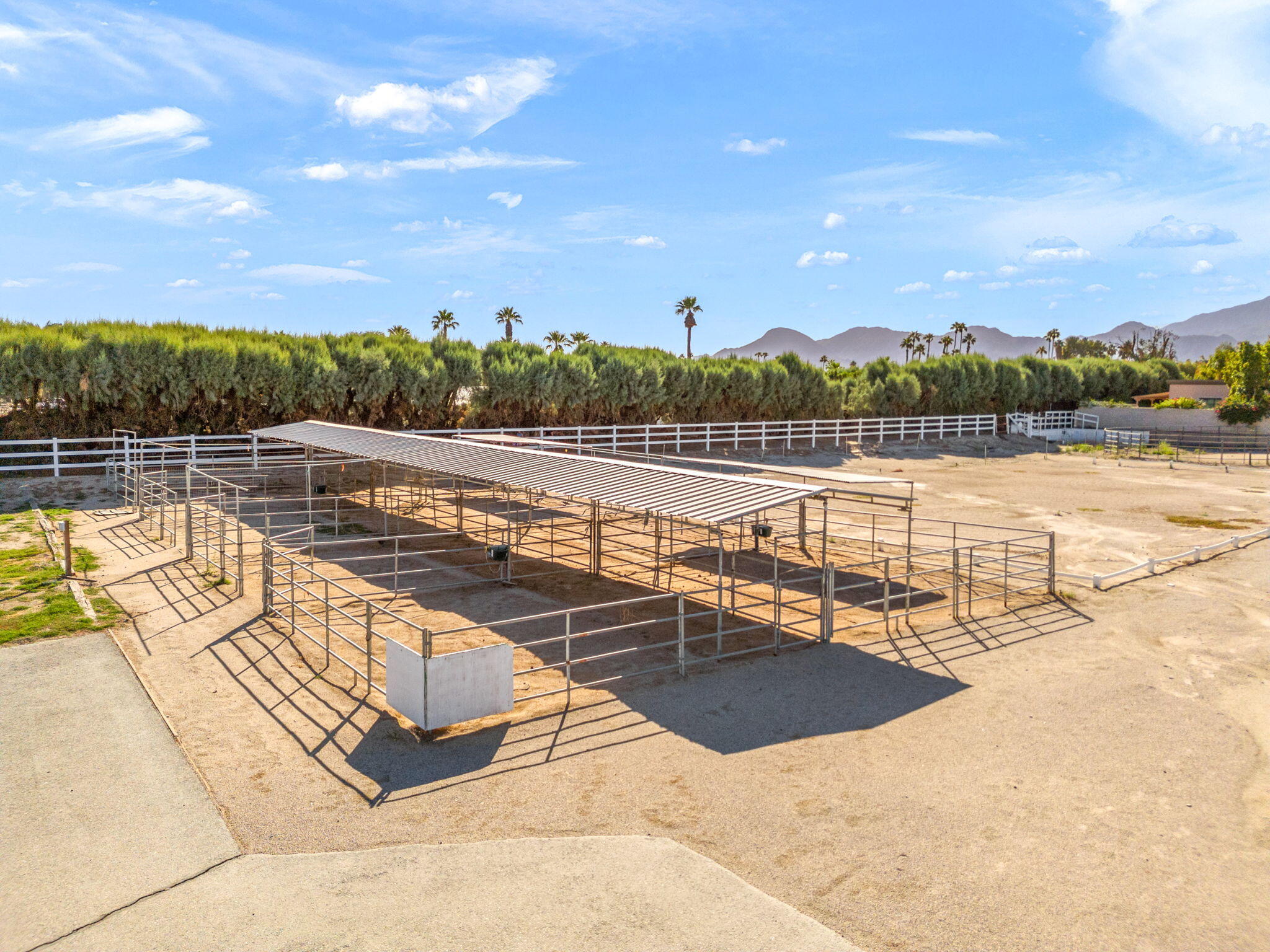 72549 Clancy Lane Rancho Mirage, CA 92270 - Photo 12 of 19 a view of a swimming pool with a lounge chair