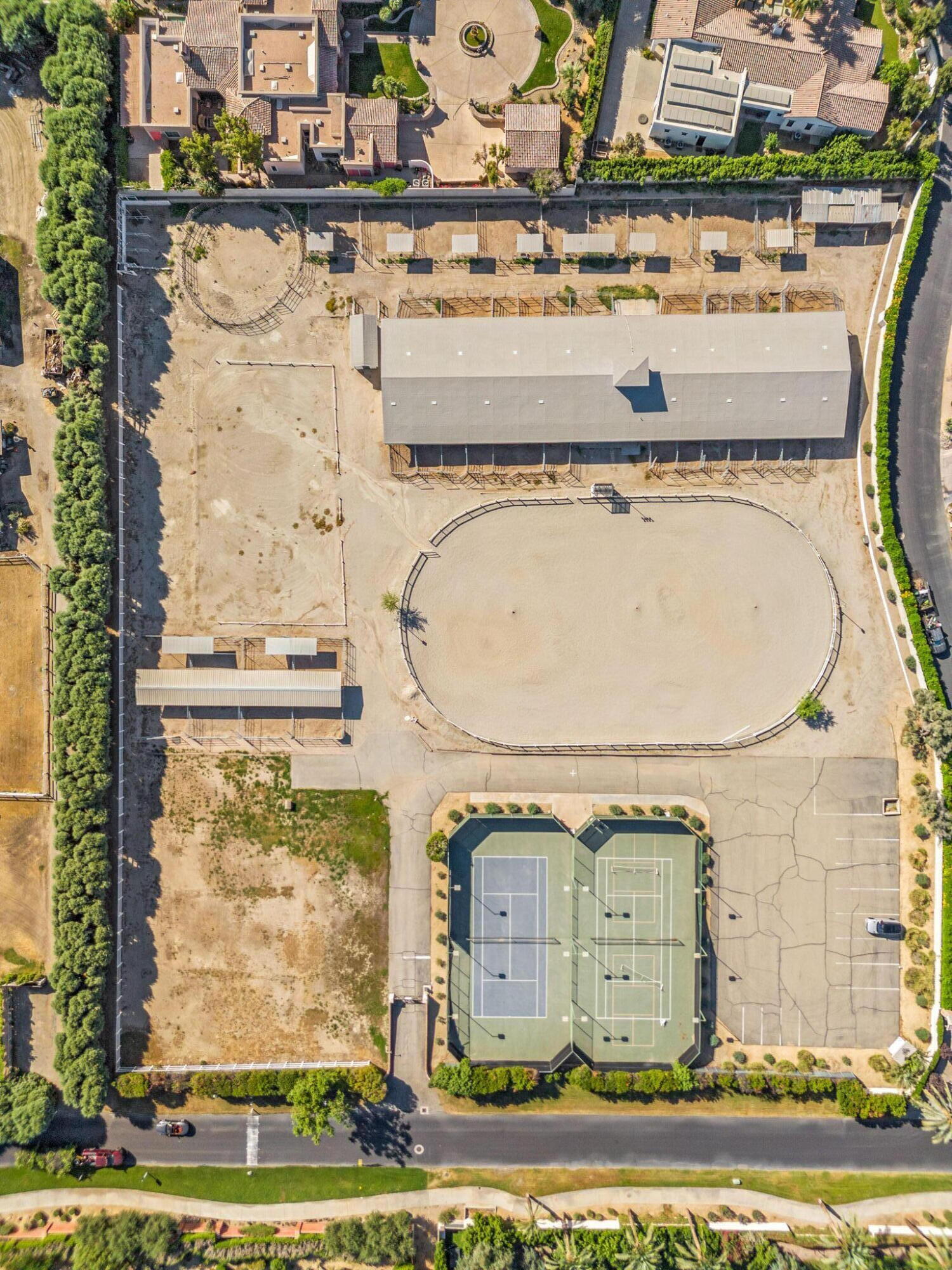 72549 Clancy Lane Rancho Mirage, CA 92270 - Photo 5 of 19 front view of a house with a fountain