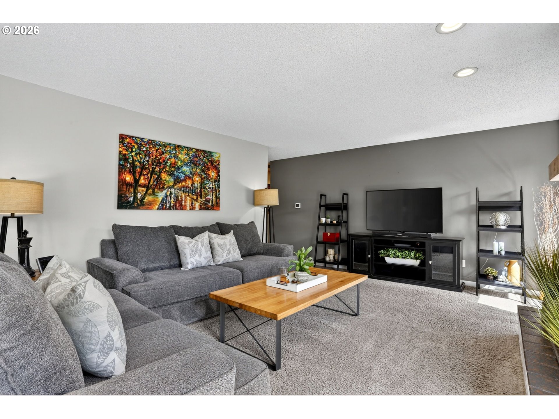 1776 Southeast 114th Place Portland, OR 97216 - Photo 23 of 47 a living room with furniture and a flat screen tv