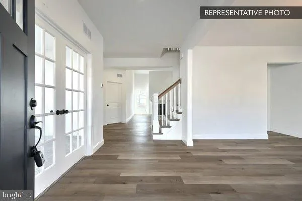 a view of entryway with stairs