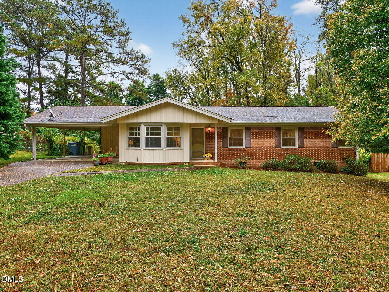 617 South Lakeside Drive Raleigh, NC 27606 - Photo 1 of 32 a front view of a house with a garden