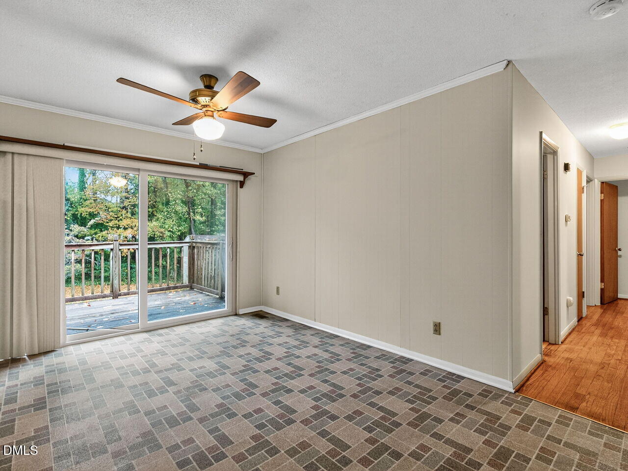 617 South Lakeside Drive Raleigh, NC 27606 - Photo 14 of 32 a view of empty room with wooden floor and fan