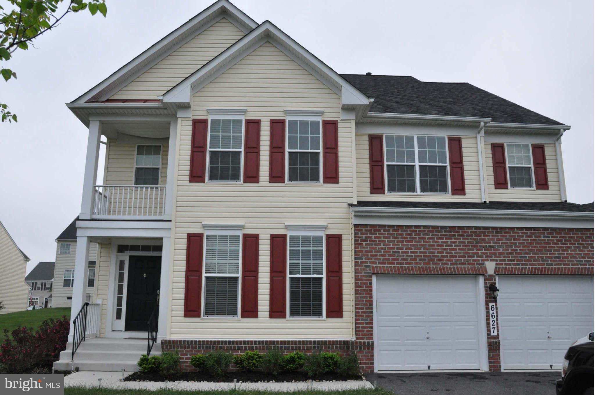 6627 Pebble Brooke Road Baltimore, MD 21209 - Photo 1 of 12 a front view of a house