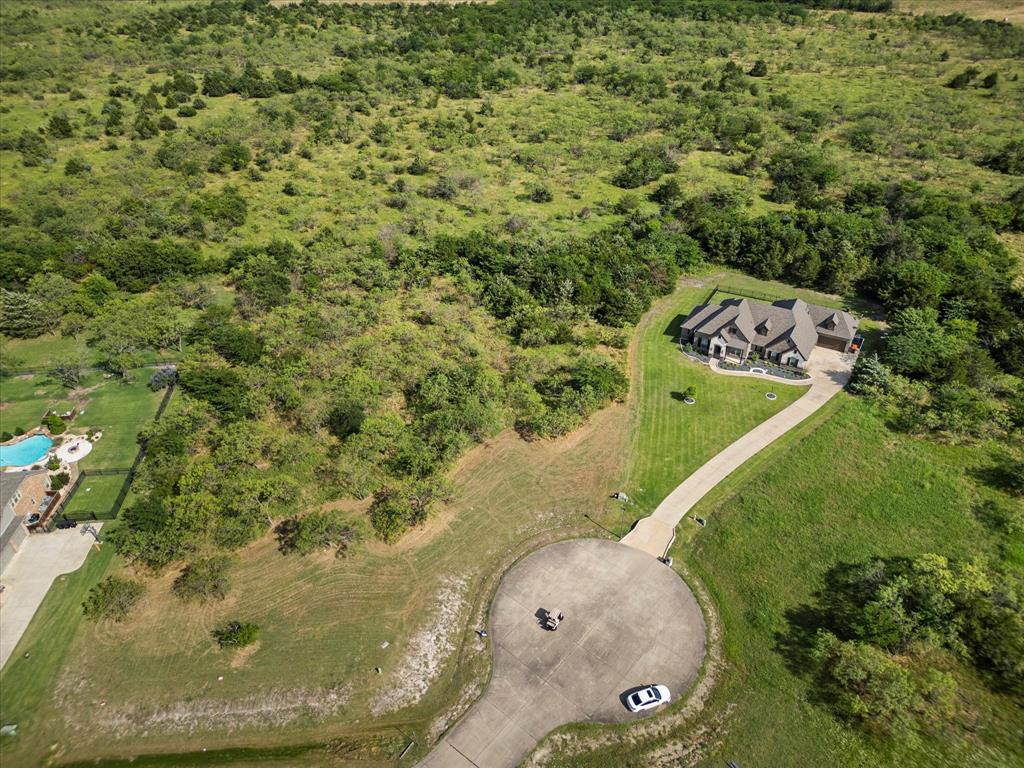 540 Austin Circle, Unit B Terrell, TX 75160 - Photo 2 of 11 an aerial view of a residential houses with outdoor space