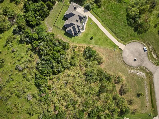 a view of a garden with a fountain