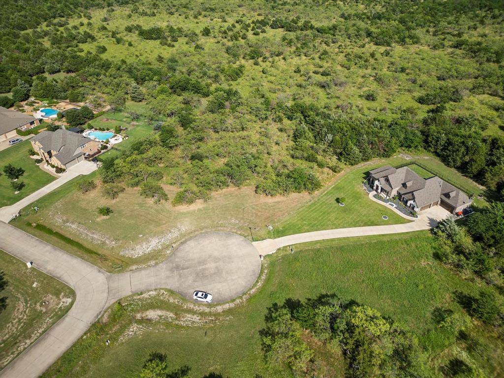 540 Austin Circle, Unit B Terrell, TX 75160 - Photo 10 of 11 a view of residential houses with outdoor space