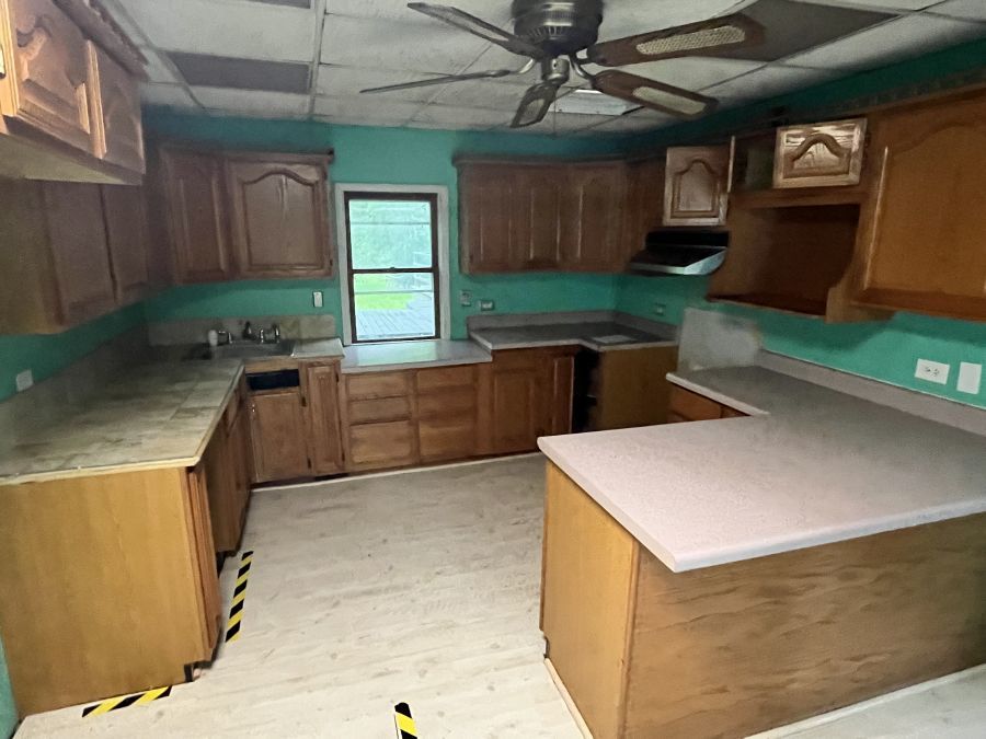 28420 West Big Hollow Road Ingleside, IL 60041 - Photo 14 of 25 a kitchen that has a sink and a stove