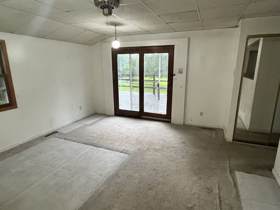 28420 West Big Hollow Road Ingleside, IL 60041 - Photo 22 of 25 a view of a livingroom with a ceiling fan and window