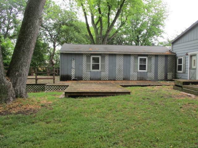 28420 West Big Hollow Road Ingleside, IL 60041 - Photo 4 of 25 a view of a backyard with a garden and tree