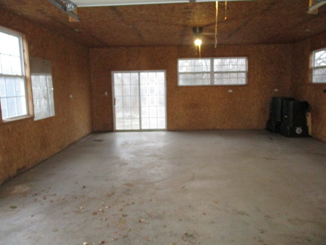 28420 West Big Hollow Road Ingleside, IL 60041 - Photo 6 of 25 an empty room with windows