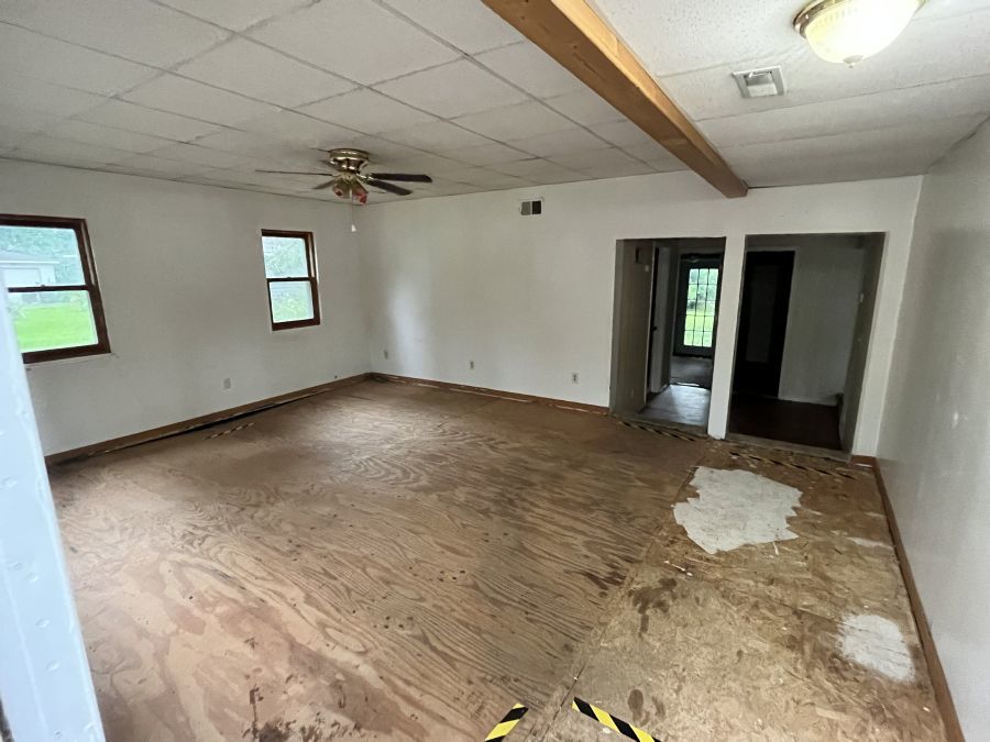 28420 West Big Hollow Road Ingleside, IL 60041 - Photo 7 of 25 an empty room with a empty space and wooden floor