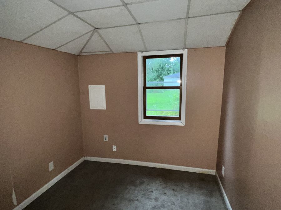 28420 West Big Hollow Road Ingleside, IL 60041 - Photo 10 of 25 an empty room with a window