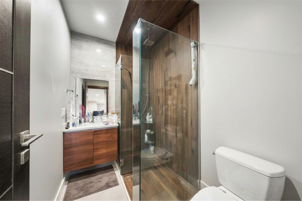 39 Lexington Street, Unit 5 Boston, MA 02128 - Photo 11 of 28 a bathroom with a toilet sink and shower