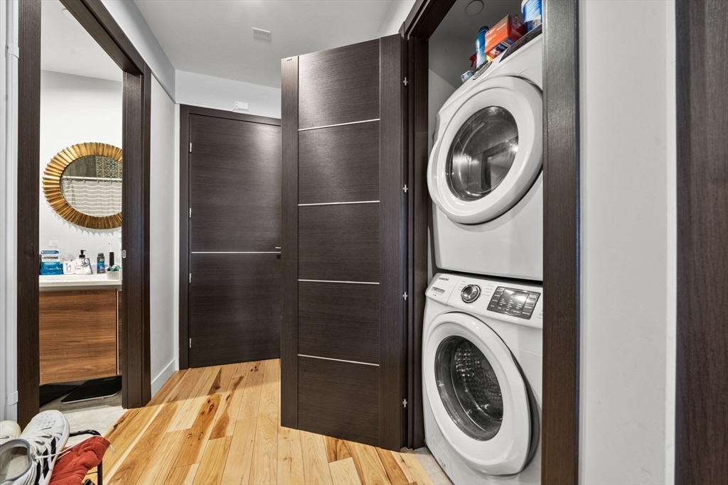 39 Lexington Street, Unit 5 Boston, MA 02128 - Photo 19 of 28 a utility room with dryer and washer