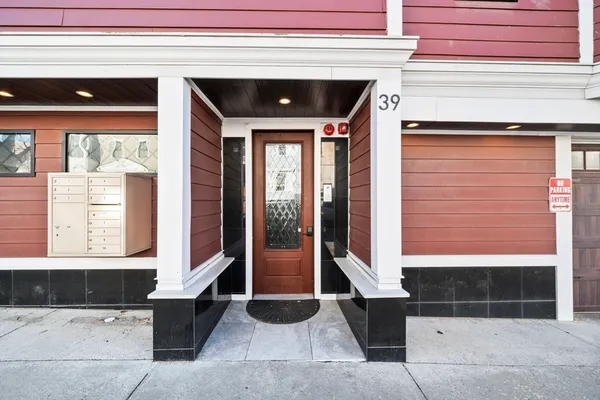 a front view of a house with a glass door